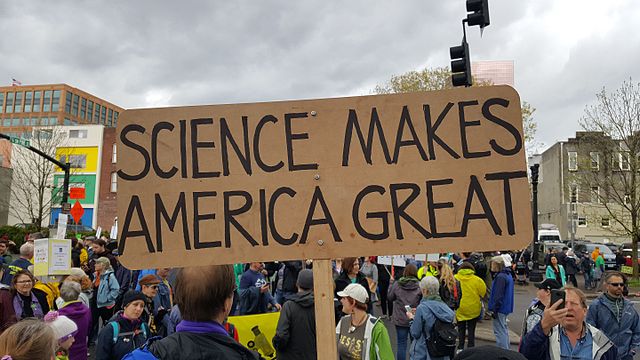 Sign at the March for Science reads "Science Makes America Great"
