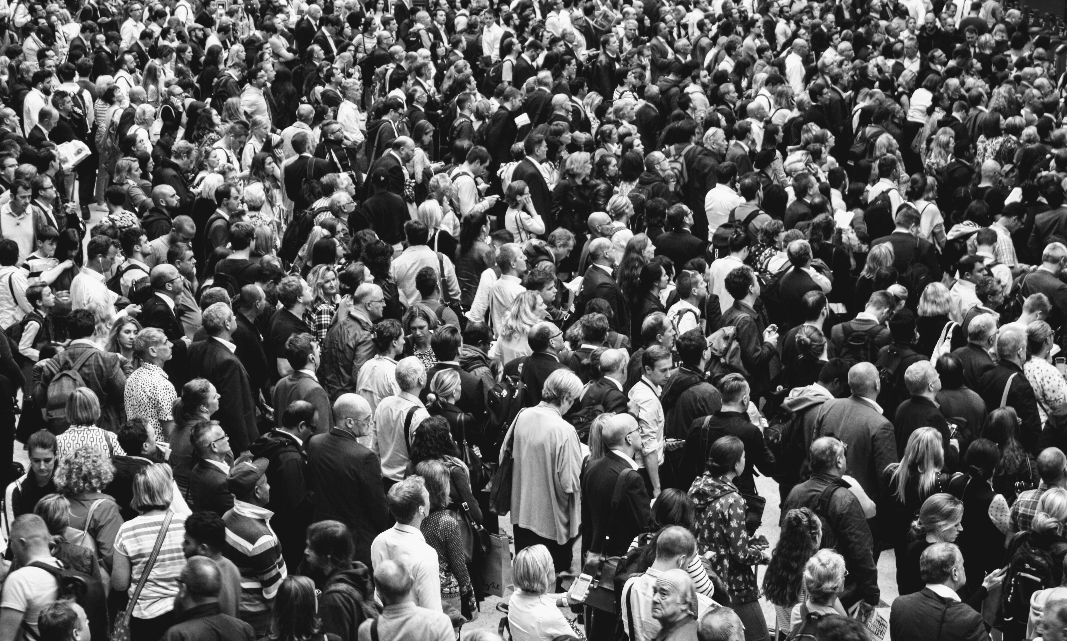Black and white image of a large crowd of people.