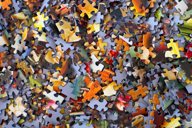 jumbled, mismatched puzzle pieces