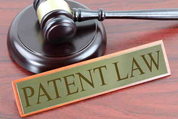 A gvel and patent law sign