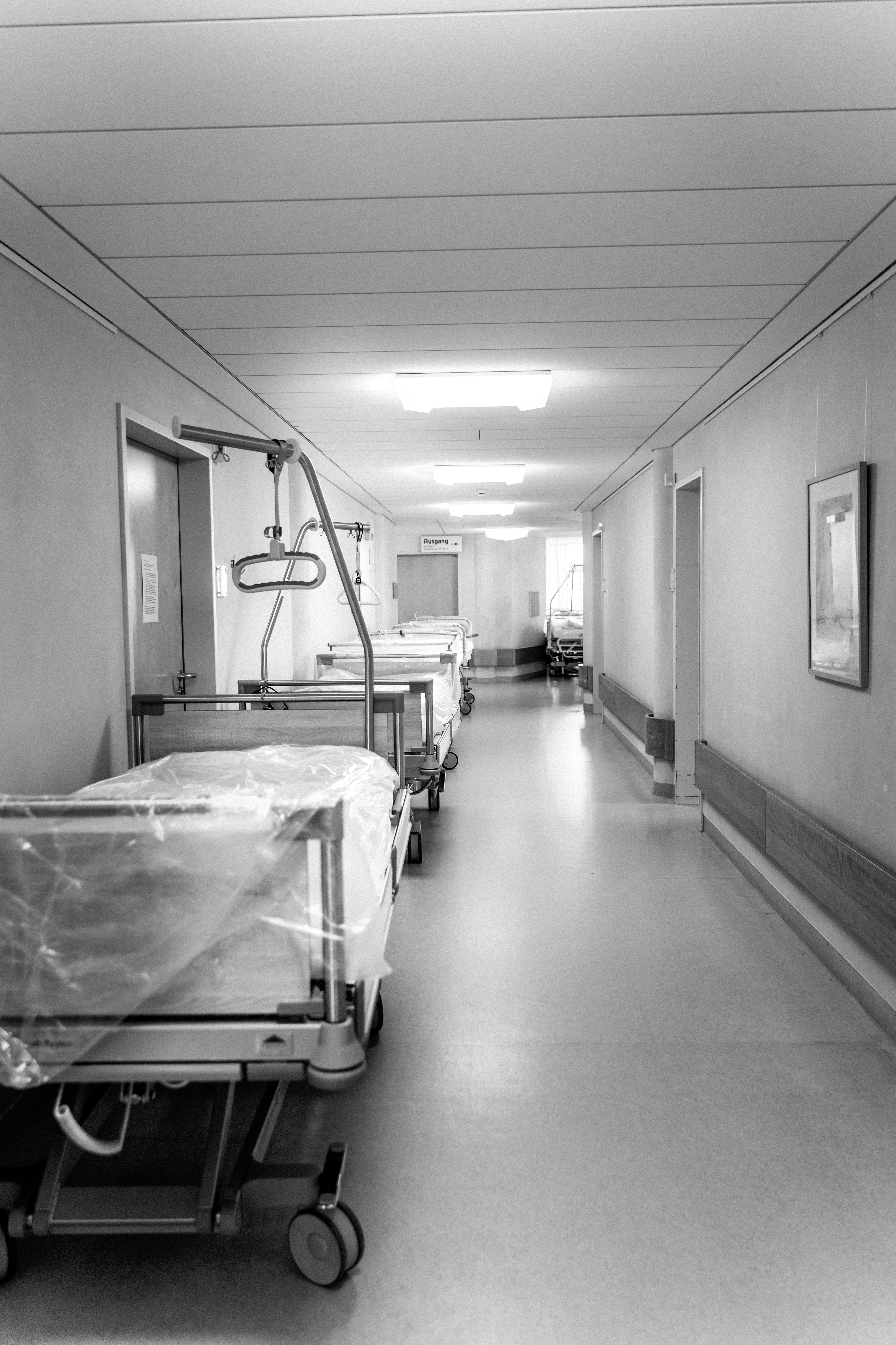 Image of a black and white hospital hallway