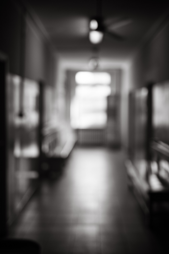 blurred photo of hospital room in greyscale
