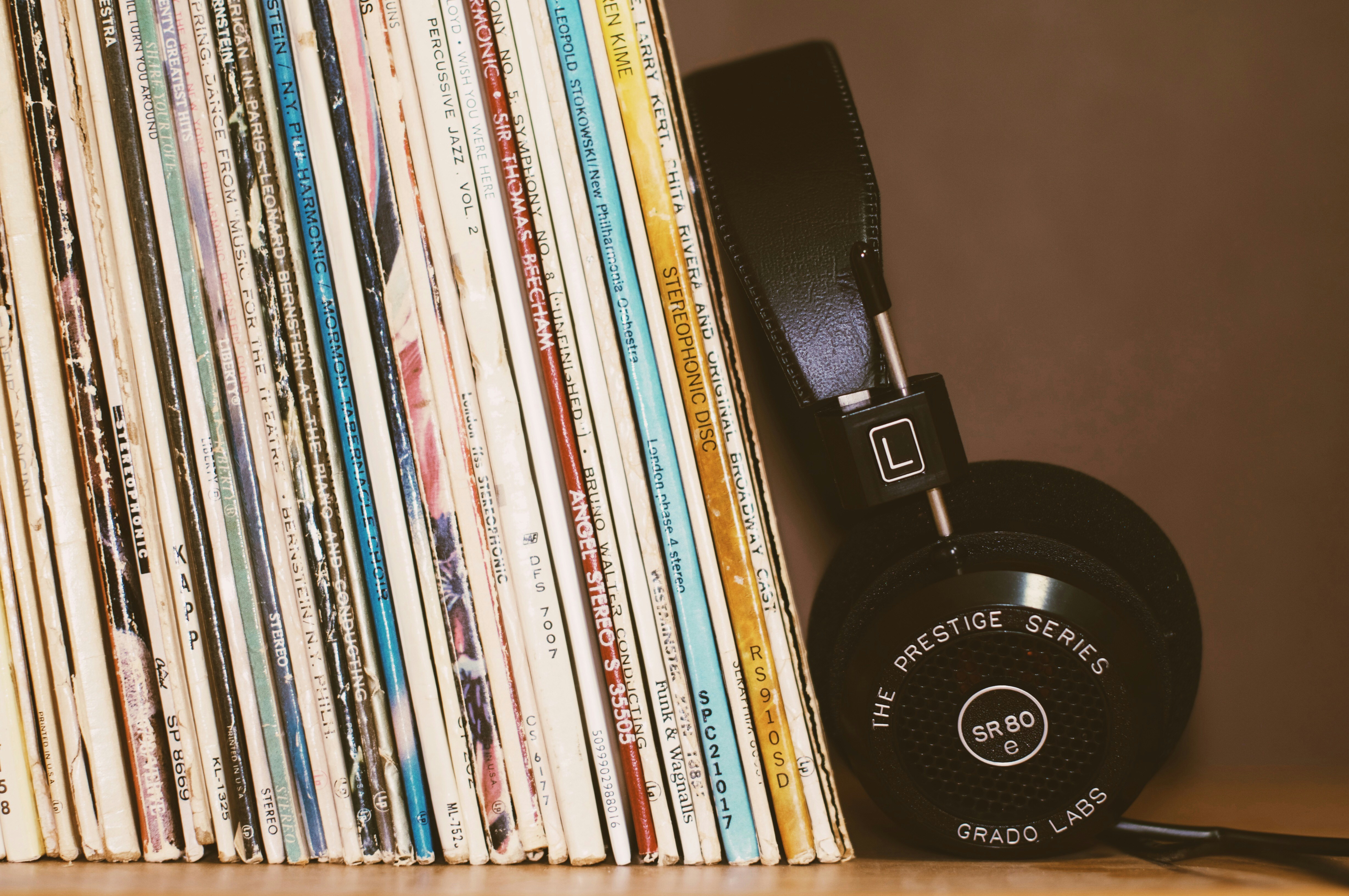 records and headphones on a shelf