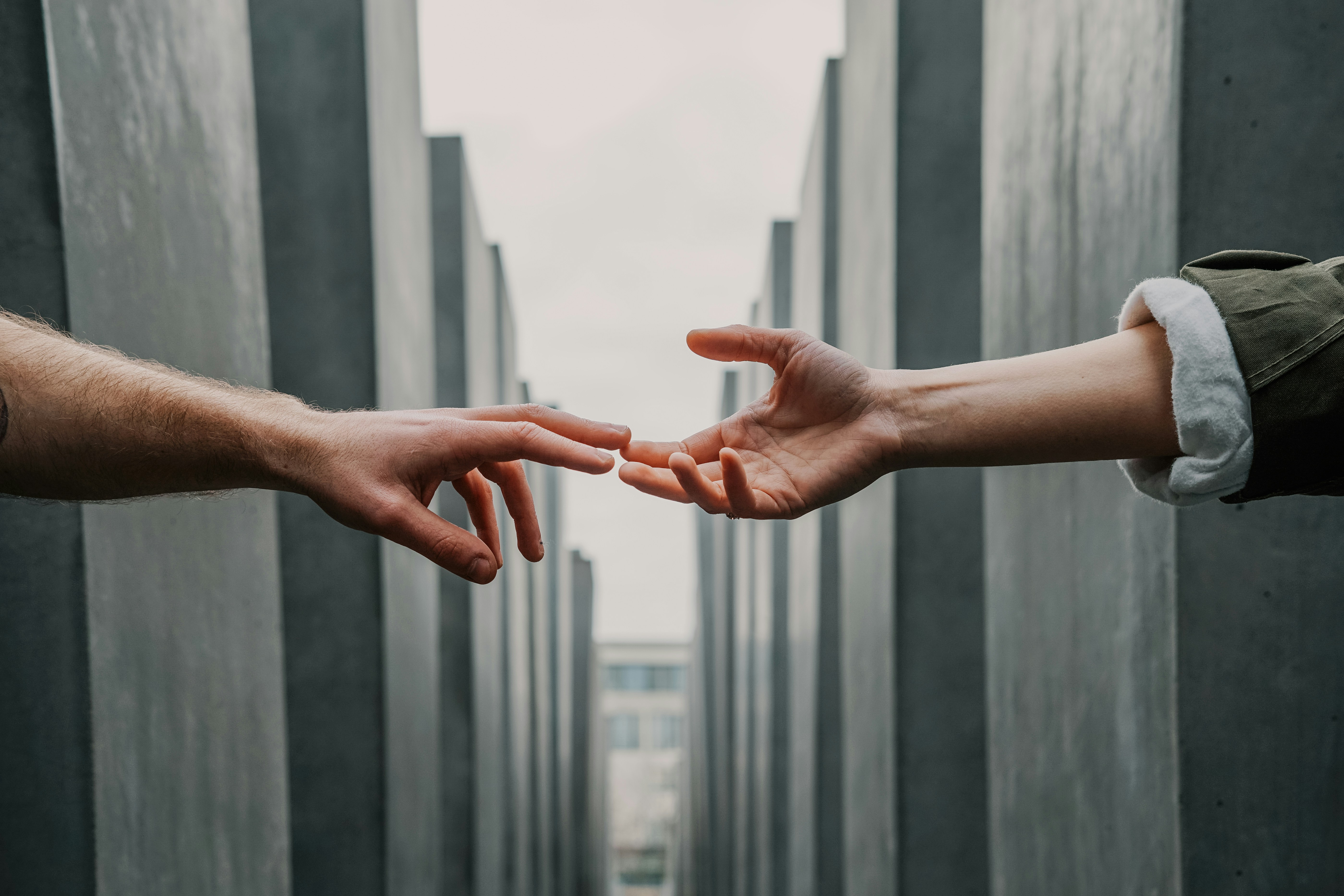 two hands meeting