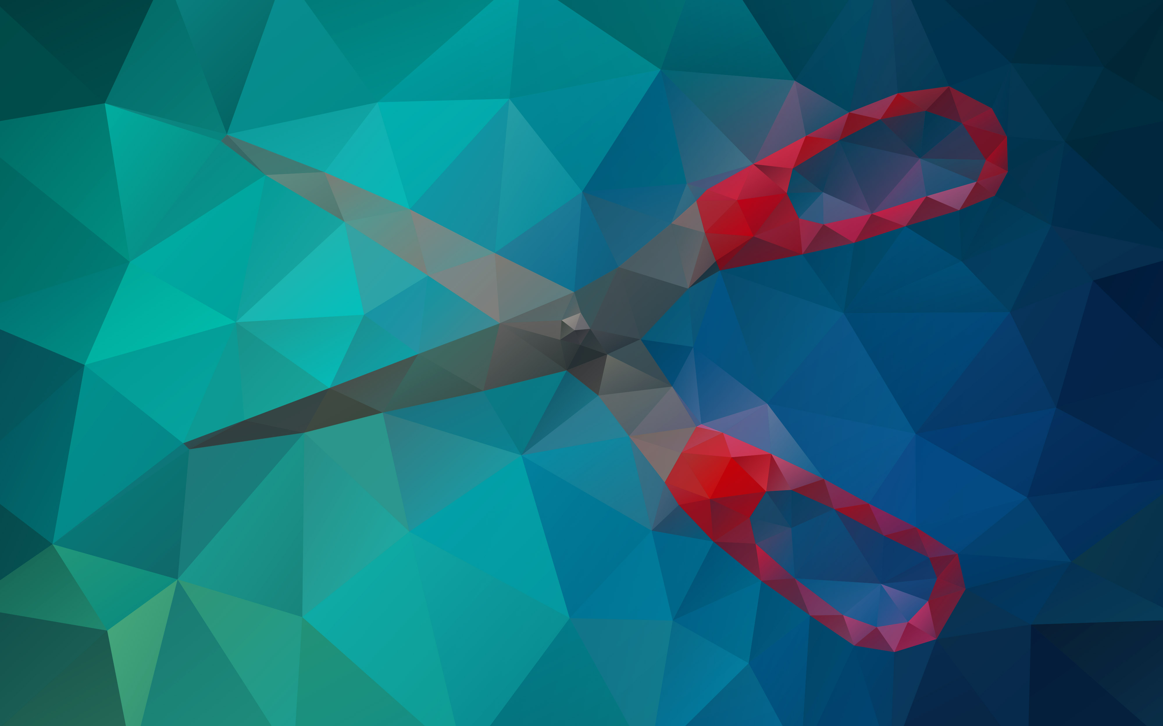 Red scissors on a blue and green background