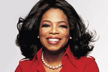 Portrait of Oprah Winfrey smiling.
