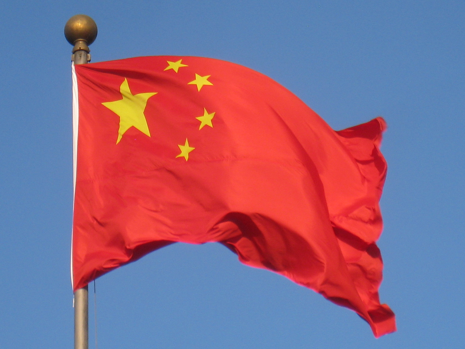 Chinese flag blowing in the wind