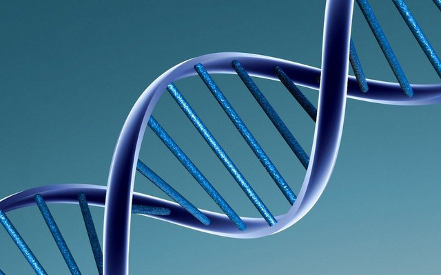 Blue double stranded DNA helix on light blue background