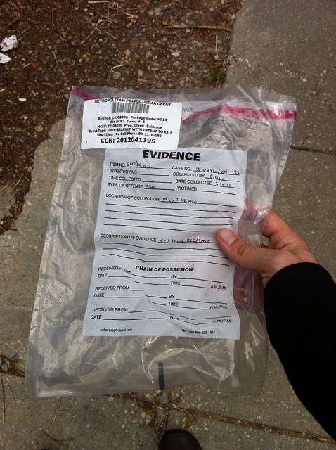 An empty, sealed bag labeled as evidence.