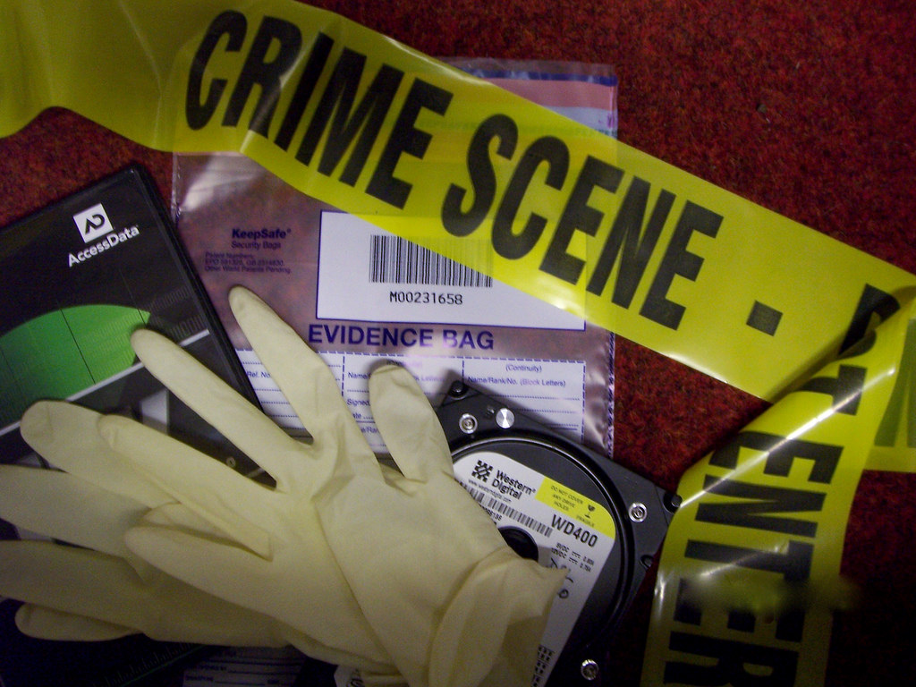 crime scene tape, gloves