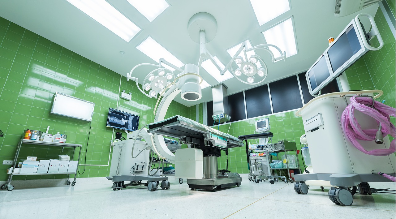 A wideshot of the inside of a surgery staging area, with the various clinical stations set up, but no persons visible.