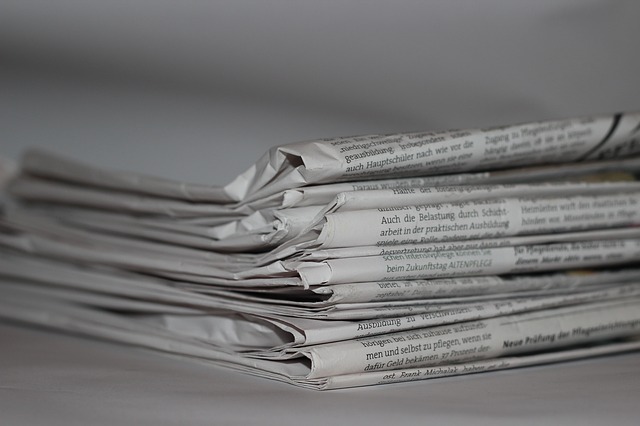 A stack of newspapers.