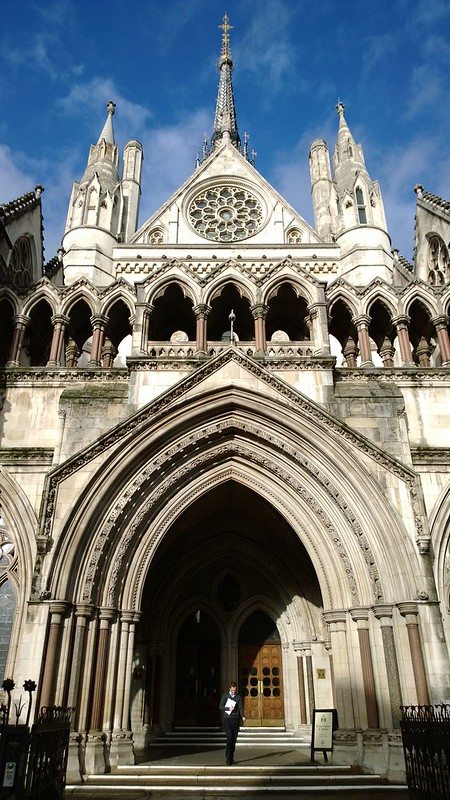 Arched gothic entrance to Royal Court of Justice in London
