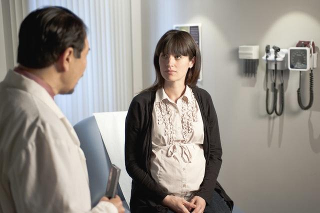 woman and doctor