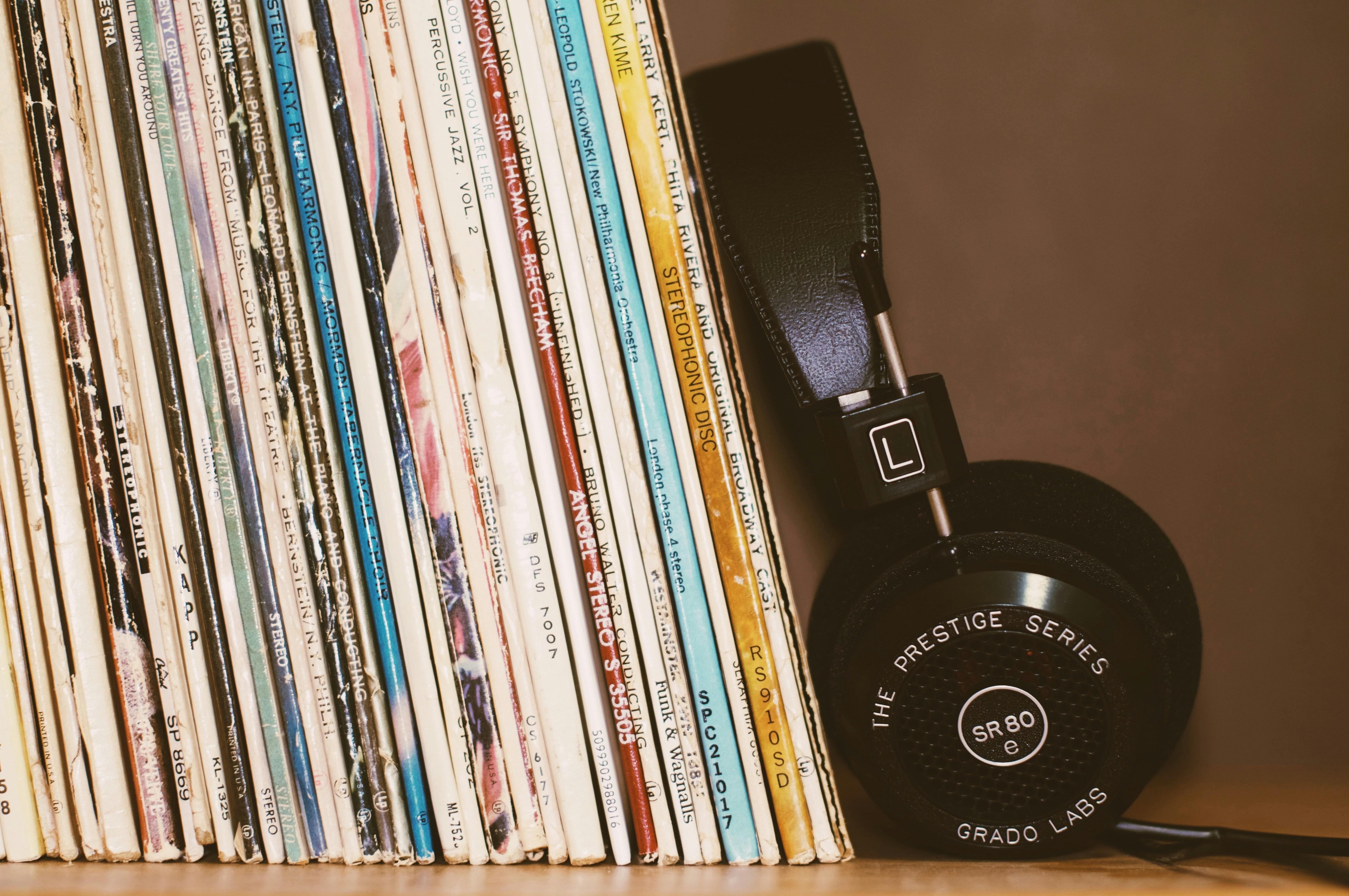 records and headphones on a shelf