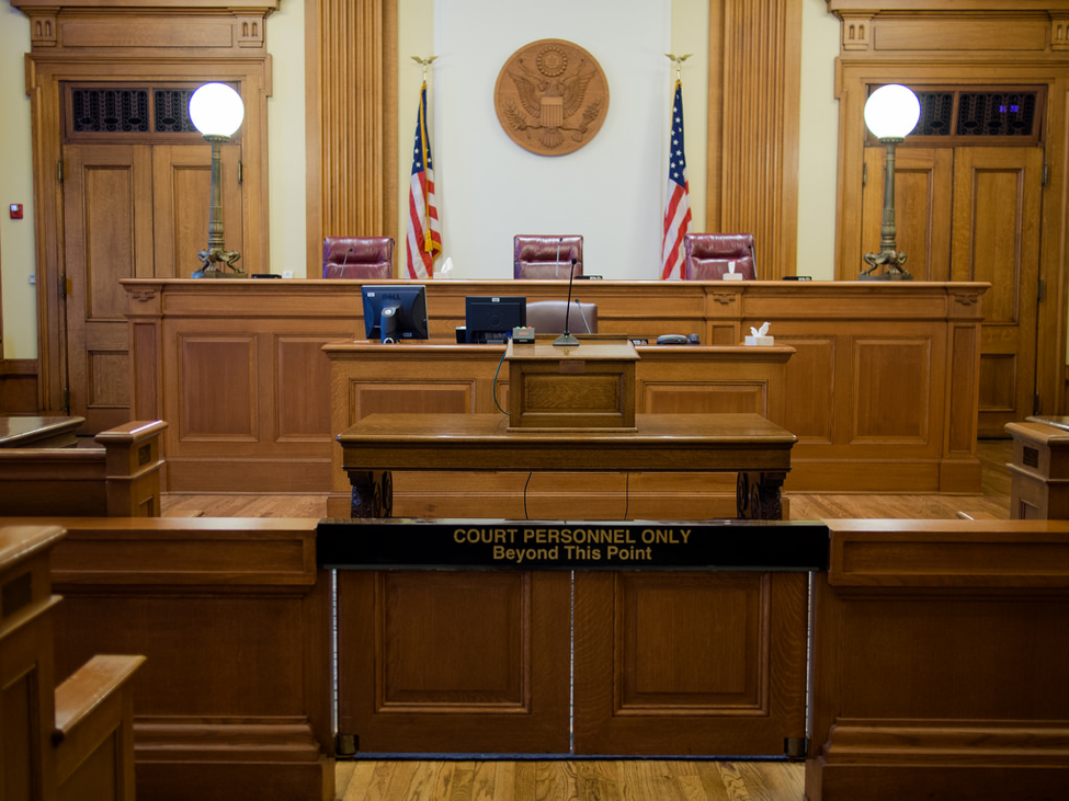 An image of an empty courtroom in the United States.