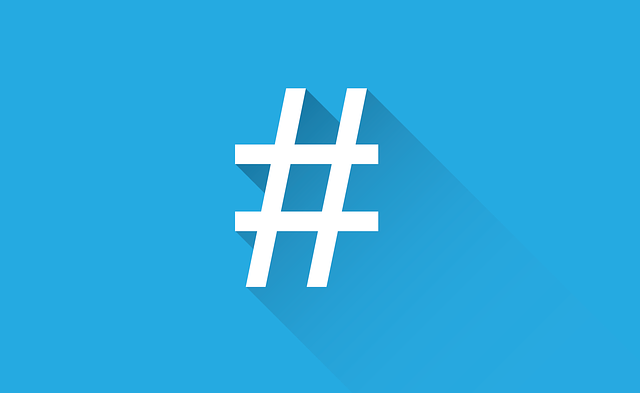 A hasthtag icon, "#," is in bold white font, against a light blue background in replication of Twitter.