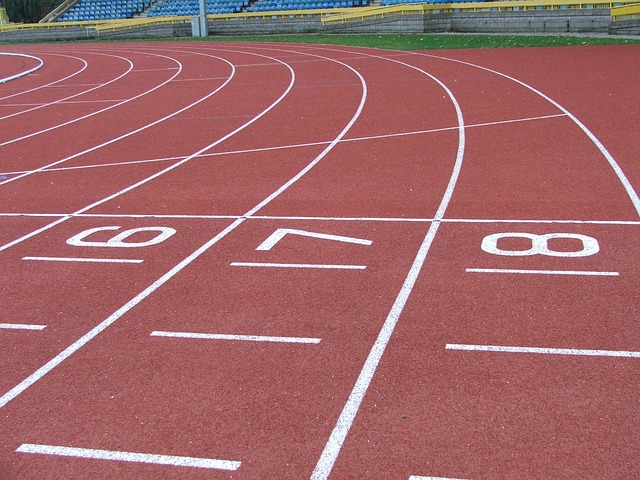 Empty race track with the lane numbers of 6, 7, and 8 marked.