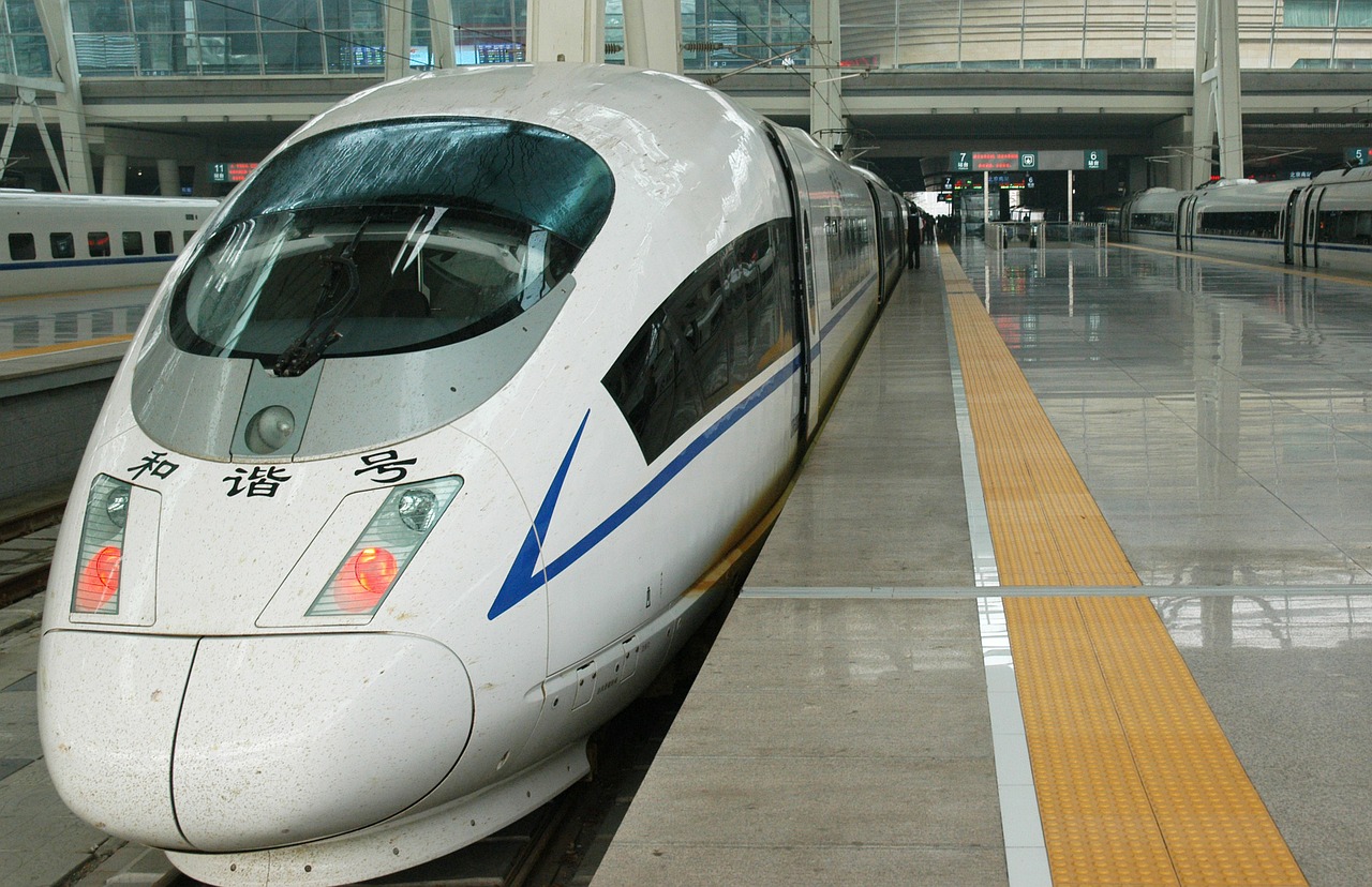 A train sits stopped in a Beijing train station.