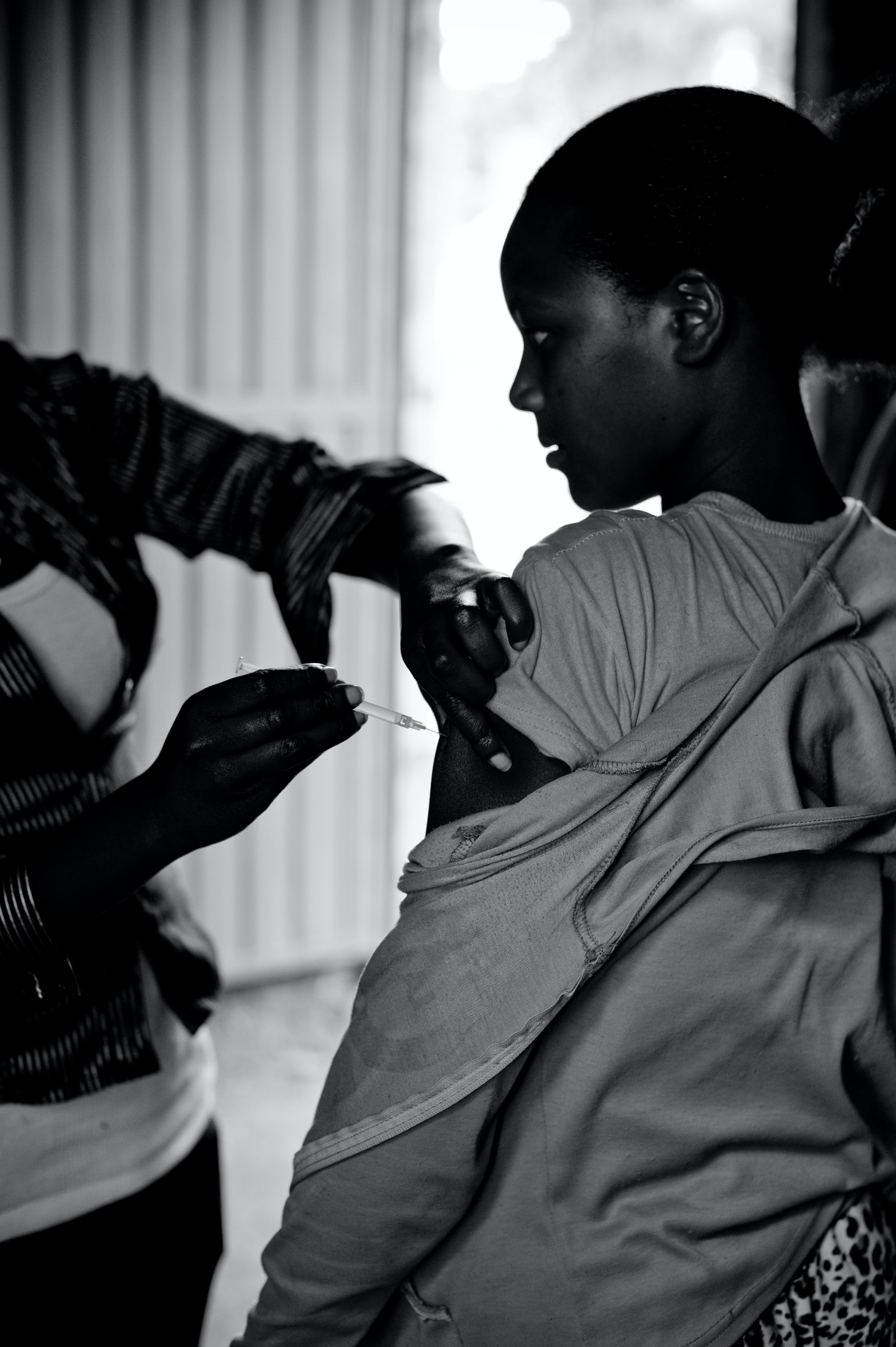 African girl getting vaccine